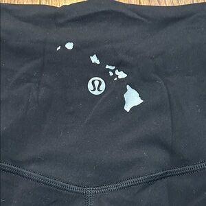 Lululemon Black Leggings with Hawaiian Map Logo